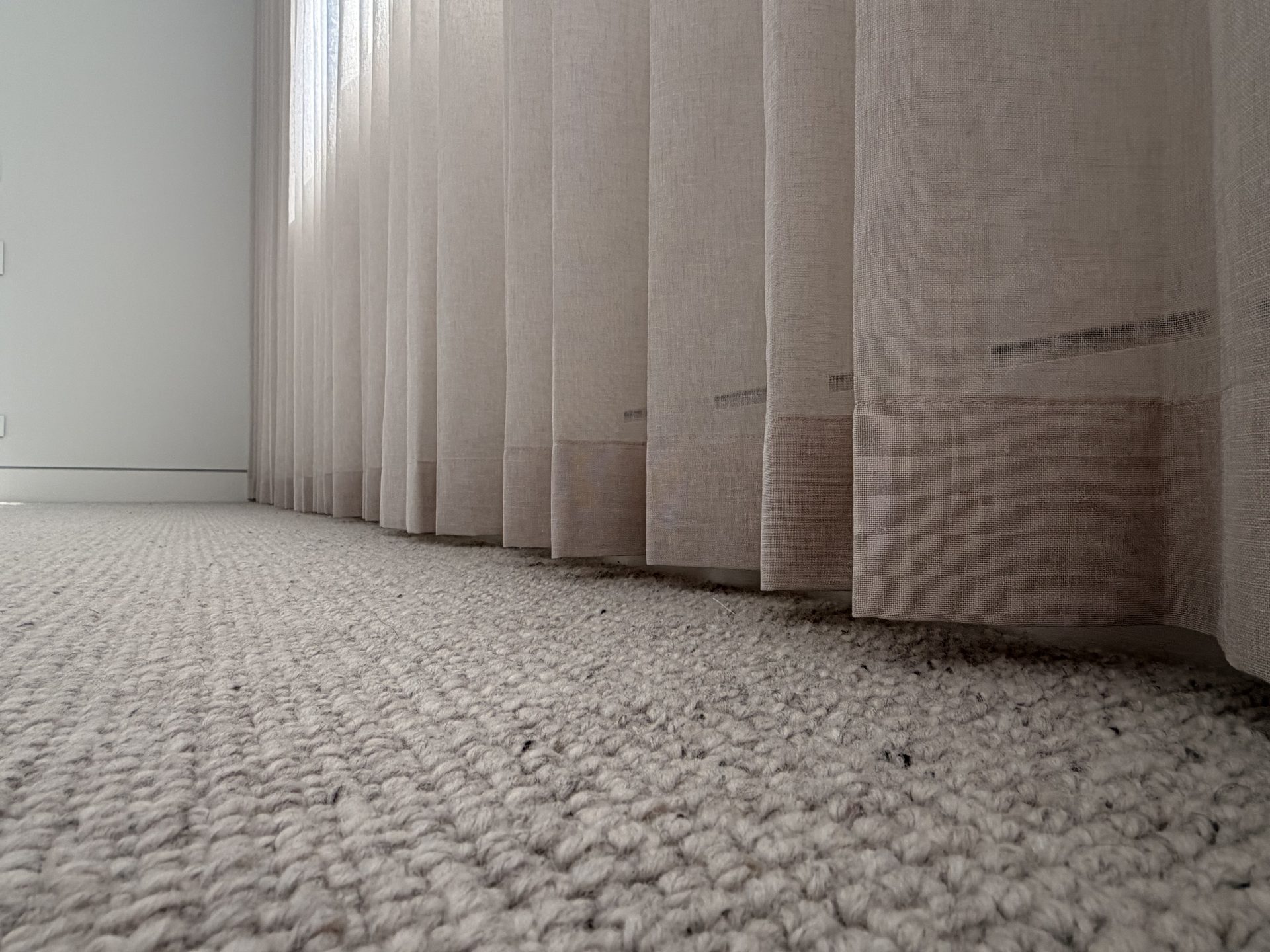 Sheer linen curtains with natural sunlight in Melbourne home — We Inspire Blinds
