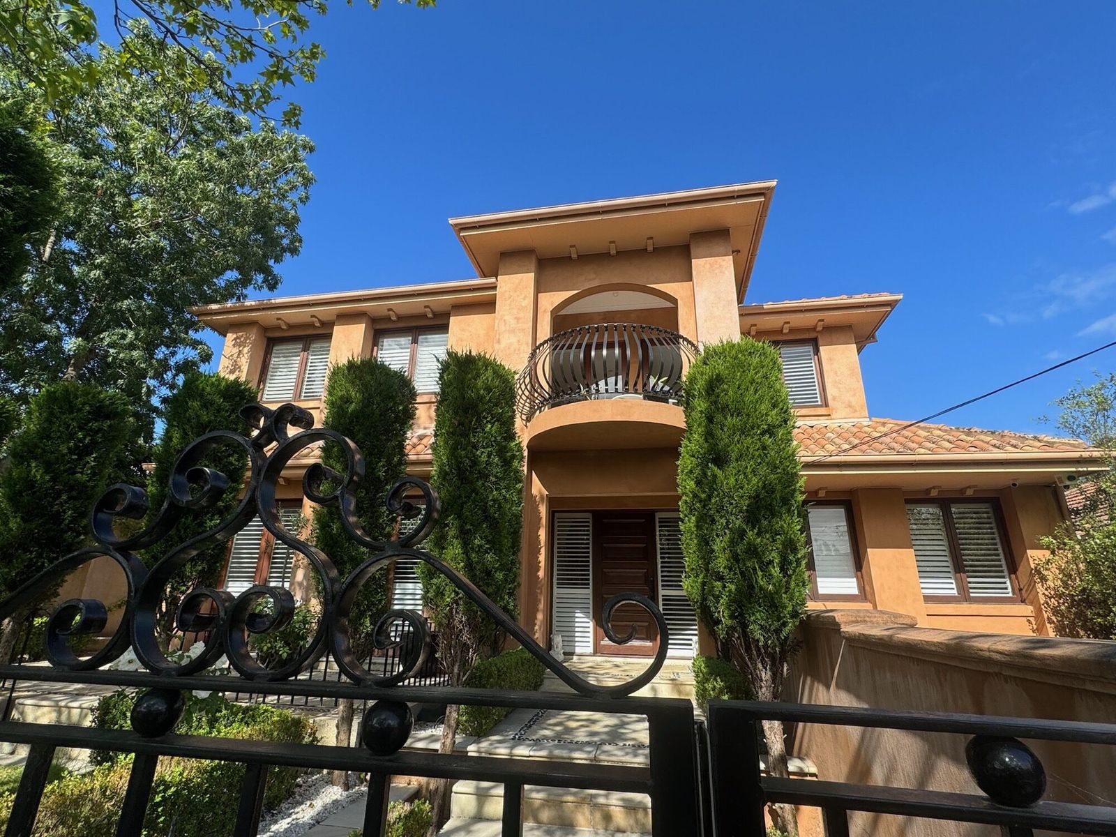 Shutters for a Tuscan-Inspired Residence